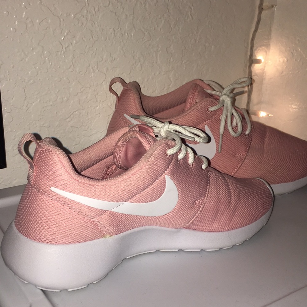 Pink and White Nike Roshe